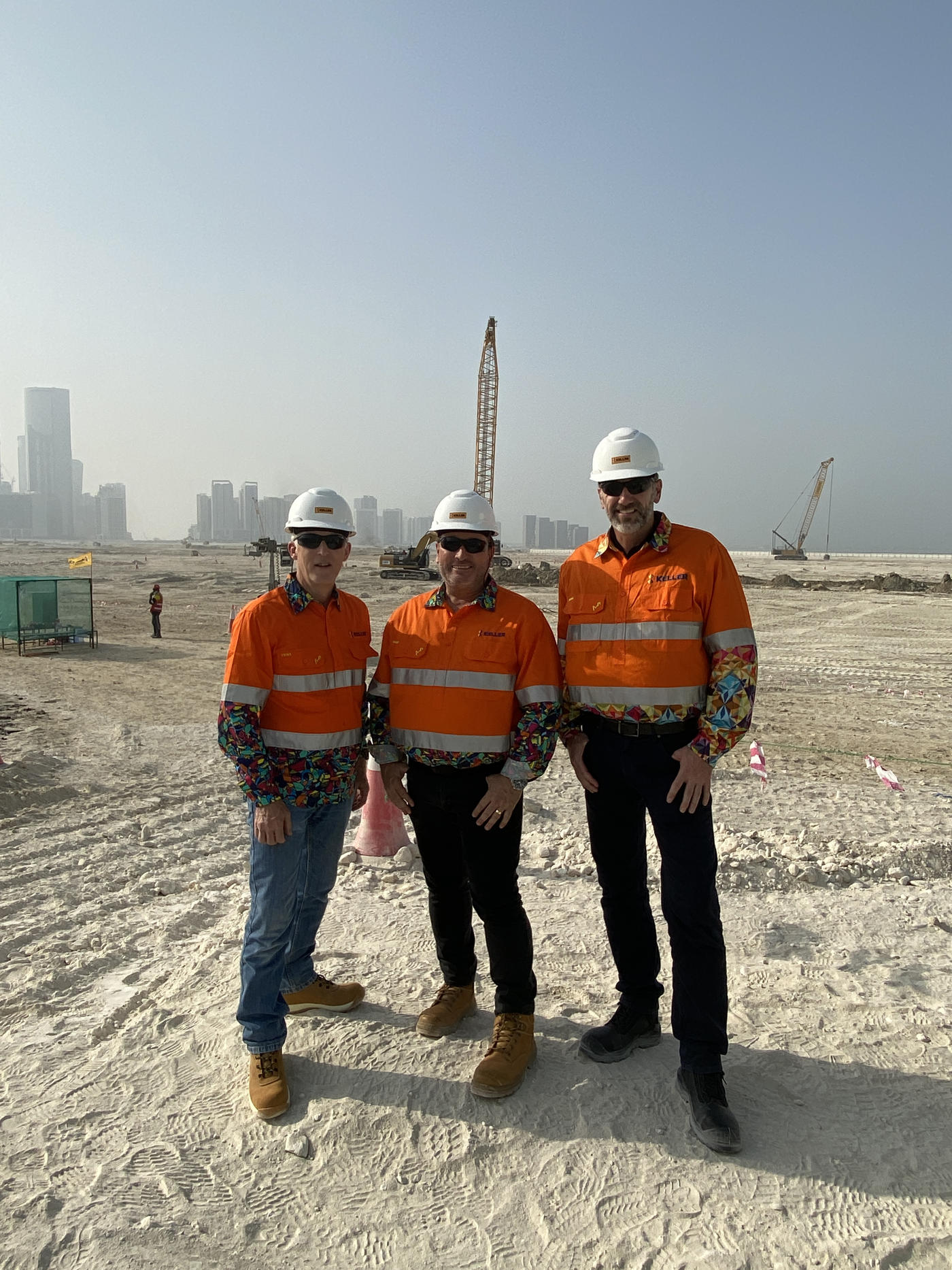 Keller executives wearing TradeMutt shirts in Dubai