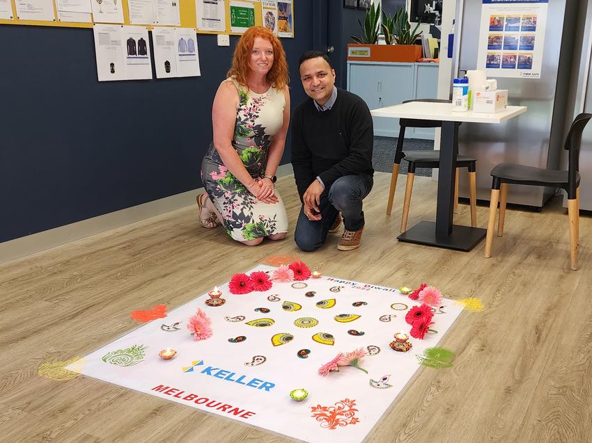 Lea and Daivesh make Keller rangoli