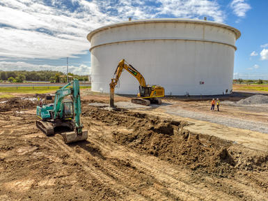 Mass mixing ground improvement solution for new tanks